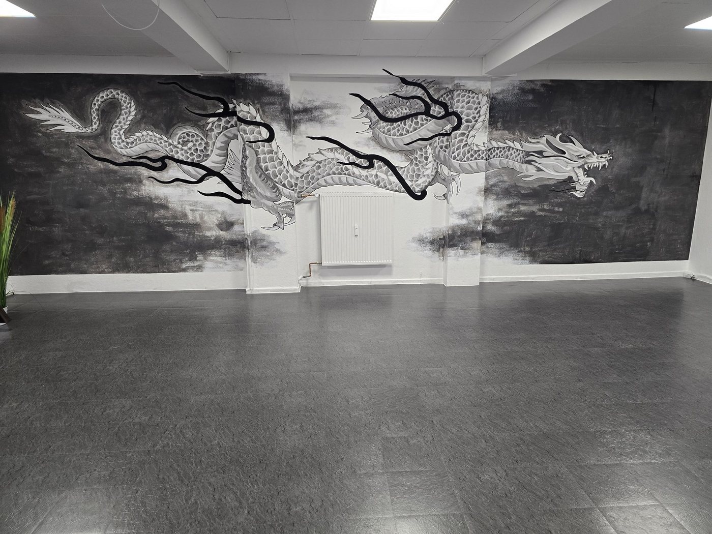Drachen-Wandbild im Trainingsraum