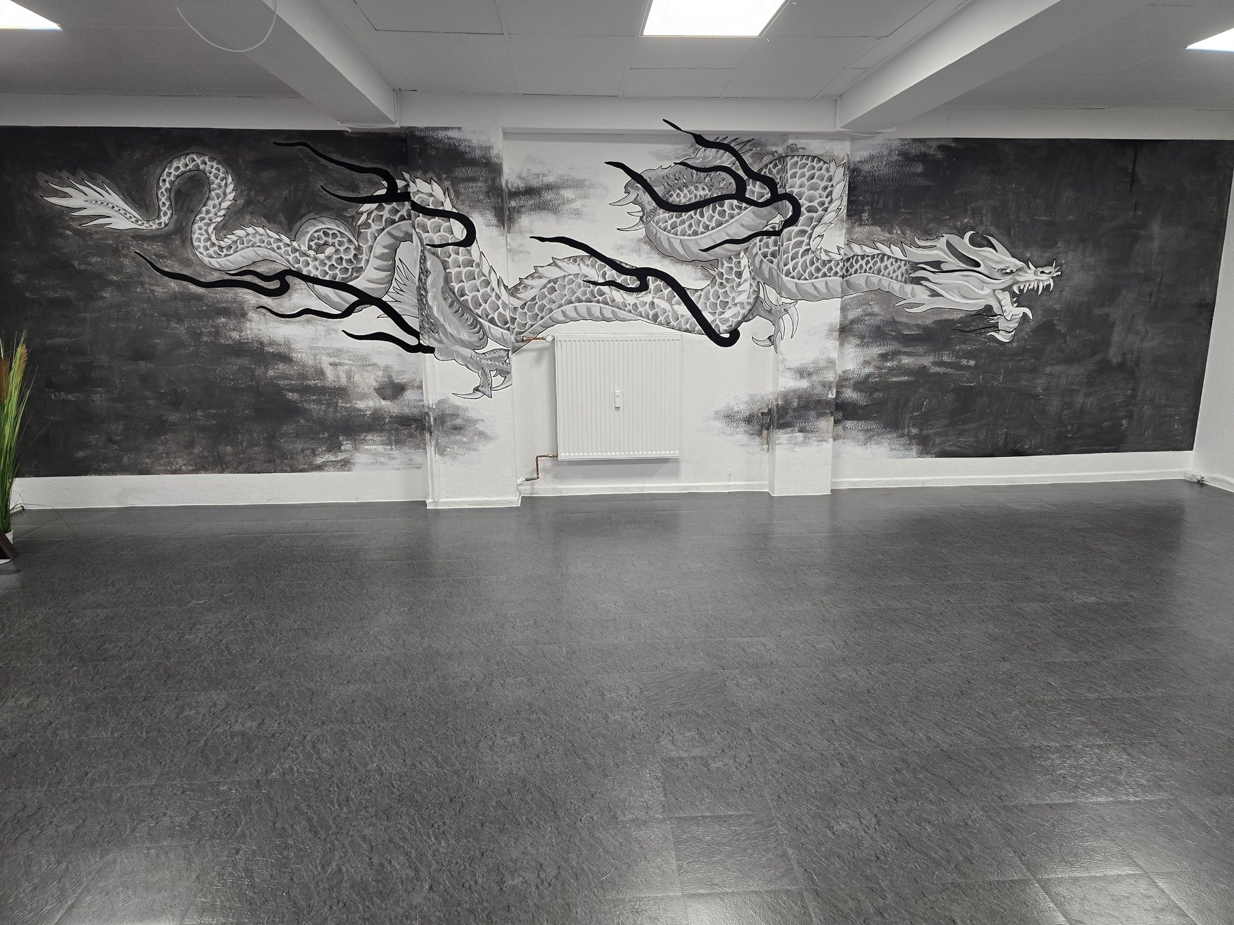 Drachen-Wandbild im Trainingsraum